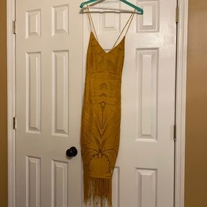 Gold mid length dress. Never worn. Size 6